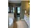 Bathroom featuring tub, glass shower, vanity and tile flooring at 337 Shadowdale Ln, Rolesville, NC 27571