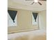 Spacious bedroom with carpet, dual windows, ceiling fan, and tray ceiling at 337 Shadowdale Ln, Rolesville, NC 27571