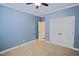 Bedroom with carpet, crown molding, a ceiling fan and double closet doors at 337 Shadowdale Ln, Rolesville, NC 27571