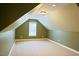 Bedroom space in an attic style home with a window at 337 Shadowdale Ln, Rolesville, NC 27571