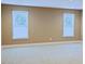 Bright and airy bedroom with two windows and neutral carpet at 337 Shadowdale Ln, Rolesville, NC 27571