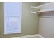 Walk-in closet with built-in shelving and storage at 337 Shadowdale Ln, Rolesville, NC 27571