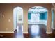 The entryway leads to a living space featuring trim, archways, coffered ceiling and large windows at 337 Shadowdale Ln, Rolesville, NC 27571