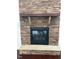 Stone fireplace features a hearth and wood mantel at 337 Shadowdale Ln, Rolesville, NC 27571