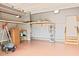 Spacious two-car garage features ample storage space and organization, enhancing functionality and convenience at 337 Shadowdale Ln, Rolesville, NC 27571