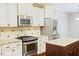 Modern kitchen equipped with stainless steel appliances, granite countertops, and center island at 337 Shadowdale Ln, Rolesville, NC 27571