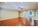 Expansive living room with hardwood floors, neutral walls, and arched doorways for an open, airy feel at 337 Shadowdale Ln, Rolesville, NC 27571