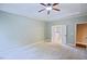 The main bedroom suite features a tray ceiling, carpet flooring, and an ensuite bath with soaking tub at 337 Shadowdale Ln, Rolesville, NC 27571