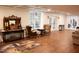 Finished basement with a large window, elegant furnishings, and hardwood-style flooring at 3750 Mebane Rogers Rd, Mebane, NC 27302