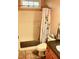 Bathroom featuring shower and tub combination with neutral tile flooring at 3750 Mebane Rogers Rd, Mebane, NC 27302