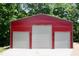Three-door red garage with durable metal construction offering ample parking and storage space at 3750 Mebane Rogers Rd, Mebane, NC 27302