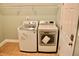 Efficient laundry room equipped with modern washer and dryer units at 3750 Mebane Rogers Rd, Mebane, NC 27302