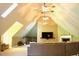 Cozy living room with high ceilings, multiple ceiling fans, fireplace, and large TV at 3750 Mebane Rogers Rd, Mebane, NC 27302