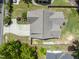 Aerial view of home featuring a newly installed roof, driveway and landscaping at 3914 Old Chapel Hill Rd, Durham, NC 27707