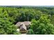 Beautiful home with a large footprint surrounded by mature trees at 4306 Infinity Ln, Durham, NC 27705
