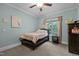 bedroom with carpet flooring and pale blue walls at 4306 Infinity Ln, Durham, NC 27705
