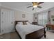 Cozy bedroom with ample natural light, ceiling fan, and neutral decor at 4306 Infinity Ln, Durham, NC 27705