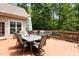 Spacious deck area with outdoor dining set, seating, and natural light at 4306 Infinity Ln, Durham, NC 27705