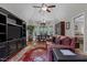 Bright living room with a vaulted ceiling, hardwood floors, and comfortable seating at 4306 Infinity Ln, Durham, NC 27705