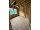 New construction bedroom showcasing a wood frame design and window with natural light at 448 Golden Dragonfly St, Wake Forest, NC 27587