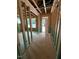Interior framing of a new construction home, showing door and window placements at 448 Golden Dragonfly St, Wake Forest, NC 27587