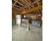 Unfinished living room featuring exposed wood beams and natural light from multiple windows at 448 Golden Dragonfly St, Wake Forest, NC 27587