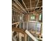New construction room showcasing a wood frame design, natural light, and drywall at 448 Golden Dragonfly St, Wake Forest, NC 27587