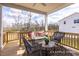 Inviting back porch with outdoor seating area and scenic views at 456 Golden Dragonfly St, Wake Forest, NC 27587