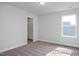 Bedroom with neutral carpet, window, closet, and neutral paint ready for your design at 456 Golden Dragonfly St, Wake Forest, NC 27587