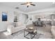 Inviting living space seamlessly connecting the living room, dining area, and kitchen at 456 Golden Dragonfly St, Wake Forest, NC 27587
