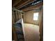 Unfinished room with a window and exposed wood frame, offering a great opportunity to personalize at 456 Golden Dragonfly St, Wake Forest, NC 27587