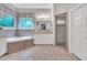 Bright bathroom featuring a soaking tub, shower, and double vanity for a spa-like experience at 4817 Fox Branch Ct, Raleigh, NC 27614