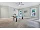 Finished game room with air hockey table, neutral-toned walls, and carpeted floors at 4817 Fox Branch Ct, Raleigh, NC 27614