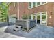 Backyard hot tub on a stone patio with steps, offering a relaxing outdoor spa experience at 4817 Fox Branch Ct, Raleigh, NC 27614
