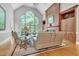 Bright living room featuring a large window, fireplace, and hardwood floors at 4817 Fox Branch Ct, Raleigh, NC 27614