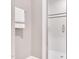 Bathroom shower with white tiles and a clear glass door at 4817 Fox Branch Ct, Raleigh, NC 27614