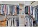 Organized walk-in closet with ample shelving and hanging space for clothes, shoes, and accessories at 4817 Fox Branch Ct, Raleigh, NC 27614