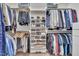 Large walk-in closet with ample storage for clothing, shoes, and personal items on shelves and hanging rods at 4817 Fox Branch Ct, Raleigh, NC 27614