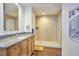 Modern bathroom featuring granite counters, a glass-enclosed shower, and updated fixtures at 601 W Rosemary St # 712, Chapel Hill, NC 27516