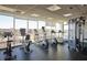Well-equipped gym with various exercise machines, offering a convenient fitness option with great natural light at 601 W Rosemary St # 712, Chapel Hill, NC 27516