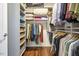 Organized walk-in closet with shelving, hanging rods, and ample storage space at 601 W Rosemary St # 712, Chapel Hill, NC 27516