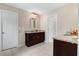 Bathroom with granite countertops, dual sinks, and modern fixtures at 62 Jubilee Ct, Clayton, NC 27527