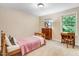 Comfortable bedroom featuring a twin bed, carpet, and matching furniture at 62 Jubilee Ct, Clayton, NC 27527