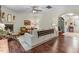 Spacious living room with hardwood floors, a fireplace, and plenty of seating at 62 Jubilee Ct, Clayton, NC 27527