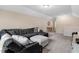Cozy living room featuring a large sectional sofa and neutral colors at 62 Jubilee Ct, Clayton, NC 27527