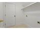 The laundry room features a door to the outside and a storage shelf at 6335 Cedar Waters Dr, Raleigh, NC 27607