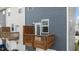 View of private backyard balcony with wood railing and neutral-colored siding at 6352 Perry Creek Rd, Raleigh, NC 27616