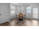 Cozy dining area featuring wood table, chairs, and natural light from nearby windows at 6352 Perry Creek Rd, Raleigh, NC 27616