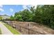Dog park with agility equipment, providing a secure and fun space for canine residents and their owners to exercise at 6352 Perry Creek Rd, Raleigh, NC 27616