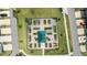 Overhead view of a community garden with plots and a gazebo, surrounded by manicured lawns at 6352 Perry Creek Rd, Raleigh, NC 27616